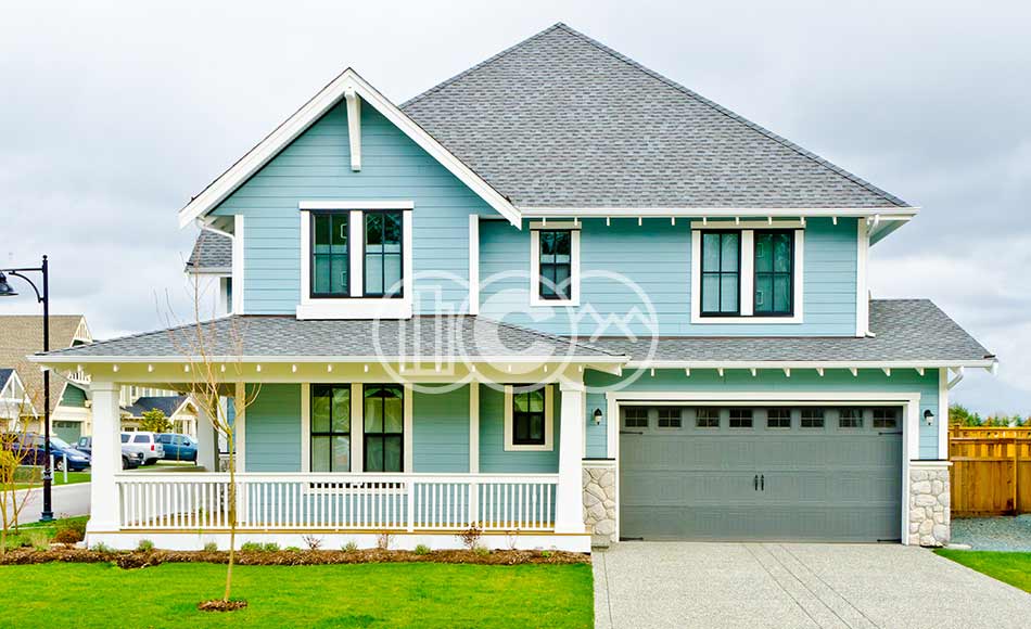 Turquoise home in residential neighborhood.