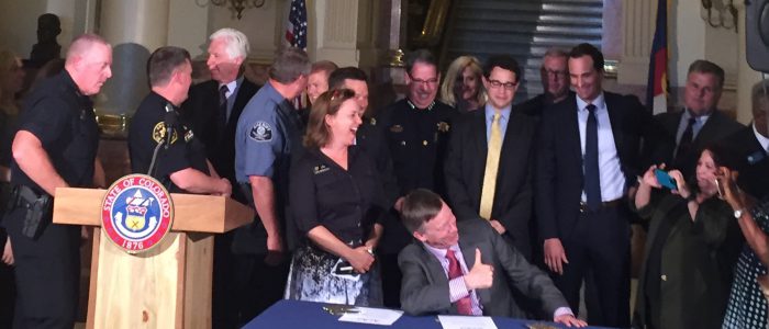 Governor Hickenlooper Gives Thumbs Up at Bill Signing