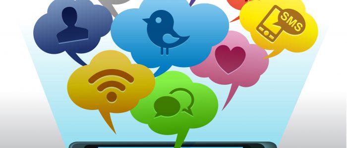 Social media concept with speech bubbles on smartphone